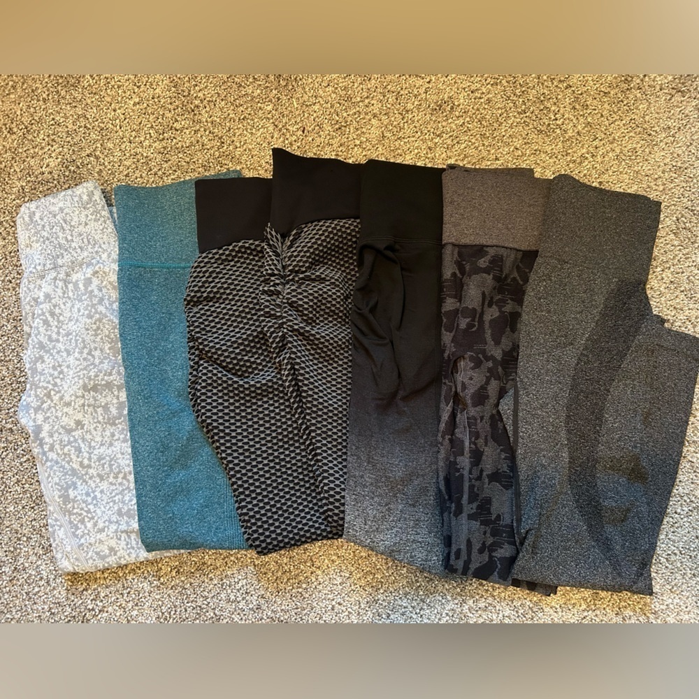 7 pairs of scrunch butt contour and tick tock leggings from amazon
